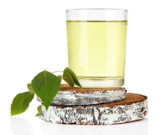 Glasses of birch sap, isolated on white