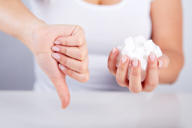 Woman,Is,Holding,A,Handful,Of,Sugar,Cubes