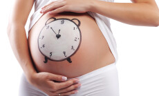 Conceptual,Image,Of,Pregnant,Belly,With,Painted,Clock