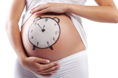 Conceptual,Image,Of,Pregnant,Belly,With,Painted,Clock