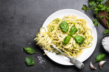 Pasta,Spaghetti,With,Zucchini,,Basil,,Cream,And,Cheese,On,Black