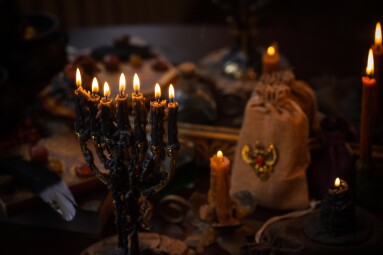 Magic,Scene,,Mystical,Atmosphere,,View,Of,Candles,On,The,Table,