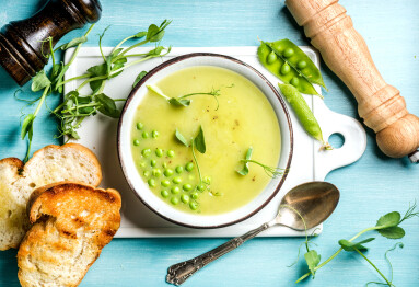 Light,Summer,Green,Pea,Cream,Soup,In,Bowl,With,Sprouts,