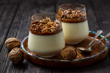 Italian,Dessert,Pannacotta,In,Glasses,With,Salted,Caramel,And,Walnuts.