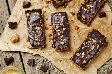Coconut,Granola,Bars,With,Chocolate,Glaze,And,Nuts.,Toning.,Selective