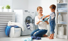 Family,Mother,And,Child,Girl,Little,Helper,In,Laundry,Room
