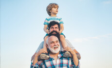 Men,Generation:,Grandfather,Father,And,Grandson,Are,Hugging,Looking,At