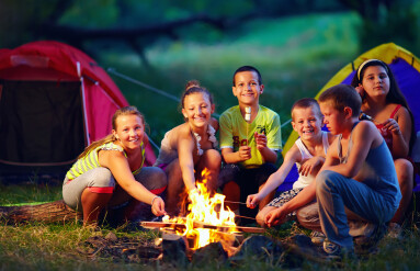 Group,Of,Happy,Kids,Roasting,Marshmallows,On,Campfire