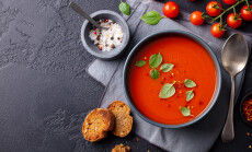 Tomato,Soup,With,Basil,In,A,Bowl.,Dark,Background.,Copy