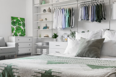 Big,Wardrobe,With,Different,Clothes,And,Accessories,In,Modern,Bedroom