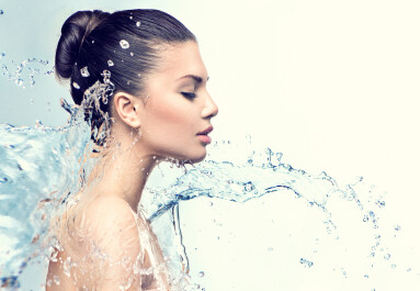 Beautiful,Model,Woman,With,Splashes,Of,Water,In,Her,Hands.
