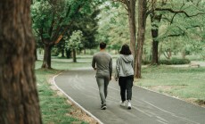 Sport,Couple,Walking,On,The,Path,In,The,Park