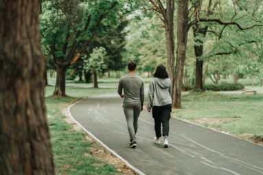 Sport,Couple,Walking,On,The,Path,In,The,Park