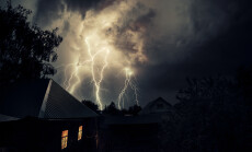 Thunderbolt,Over,The,House,And,Dark,Stormy,Sky,On,The
