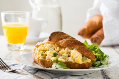 Breakfast,Of,Croissant,Stuffed,Scrambled,Eggs,With,Juice,And,Coffee