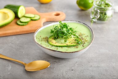 Bowl,With,Green,Gazpacho,And,Ingredients,On,Grey,Background
