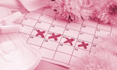 Menstrual,Pads,And,Tampons,On,Menstruation,Period,Calendar,With,White