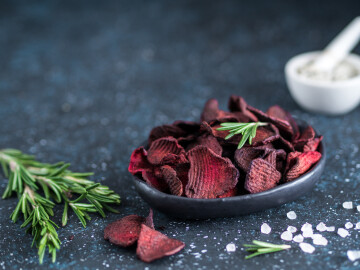 Baked,Beet,Slices,With,Coarse,Sea,Salt,Scented,Rosemary.,Vegan