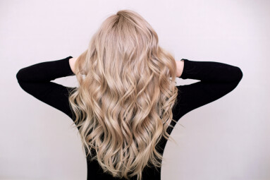 Female,Back,With,Long,,Curly,,Natural,Blonde,Hair,,In,Black