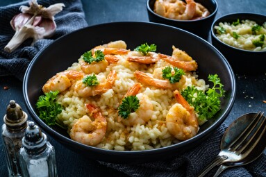 Risotto,With,Prawns,,Chili,And,Parsley,On,Wooden,Table
