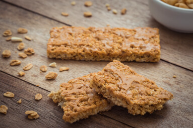 Granola,Bars,On,Wooden,Table,And,Peanuts