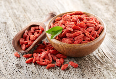 Goji,Berry,On,A,Wooden,Background