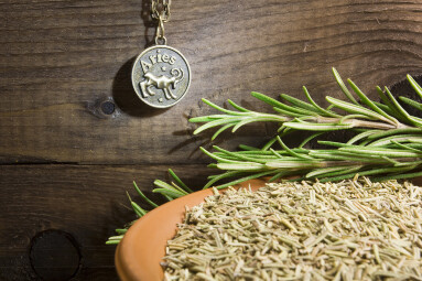 Rosemary,And,Zodiac,Sign,On,A,Wooden,Background