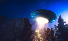 Low,Key,Image,Of,Ufo,Hovering,Over,A,Forest,At