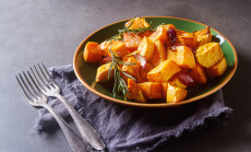 Sweet,Potatoes,With,Onions,And,Rosemary.,Dark,Background