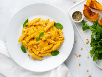 Pumpkin,Pasta,Penne,With,Creamy,Sauce,Of,Baked,Squash,On