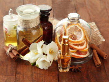 Bottles,With,Ingredients,For,The,Perfume,On,Wooden,Background