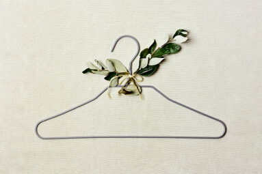 Iron,Hanger,With,Sprig,Of,The,Tree,With,Leaves,On