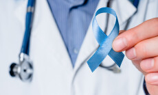 Prostate,Cancer,Awareness.,Blue,Ribbon,In,Doctor,Hand.,Man,,Male