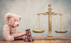 Bronze,Law,Scales,And,Teddy,Bear,With,Wooden,Gavel,On