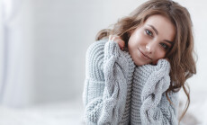 Woman,Indoor,Portrait.,Young,Beautiful,Woman,In,Warm,Knitted,Clothes