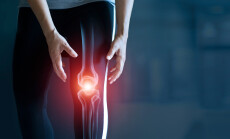 Woman,Suffering,From,Pain,In,Knee,,Injury,From,Workout,And