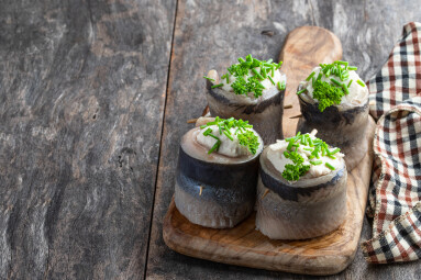 Appetizing,Pickled,Herring,Rolls,Stuffed,With,Cream,Cheese,And,Egg