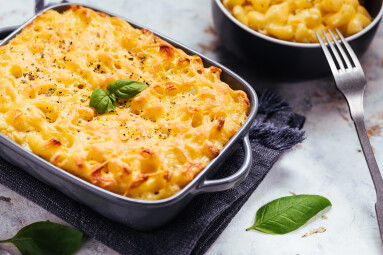 Mac,And,Cheese,Baked,In,Oven,With,Basil,Leaves