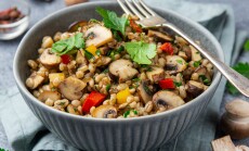Warm,Pearl,Barley,Salad,With,Mushrooms,And,Vegetables,In,Grey