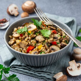 Warm,Pearl,Barley,Salad,With,Mushrooms,And,Vegetables,In,Grey