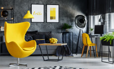 Designer's,Yellow,Chair,Next,To,Simple,Table,In,Living,Room
