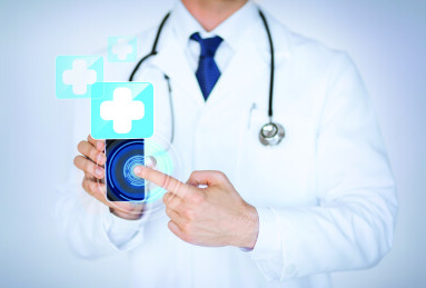 Close,Up,Of,Male,Doctor,Holding,Smartphone,With,Medical,App