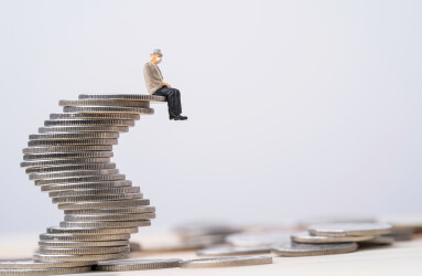 Old,Man,Miniature,Figure,Sitting,On,Coins,Stacking,With,Copy