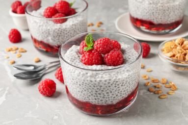 Delicious,Chia,Pudding,With,Raspberries,And,Mint,On,Light,Marble