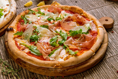 Pizza,With,Parma,Ham,And,Arugula