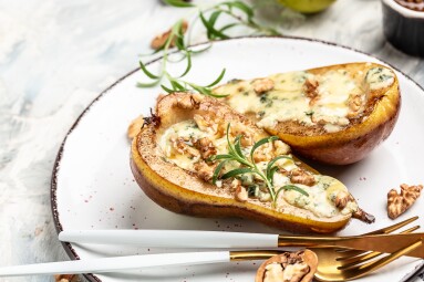 Baked,Pears,With,Cheese,And,Nuts,On,A,Light,Background.
