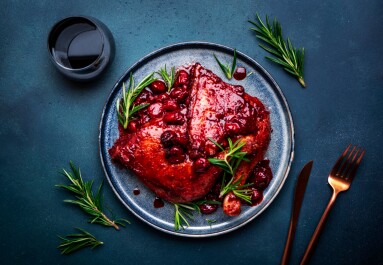 Baked,Duck,Legs,In,Wine,And,Cherry,Sauce,With,Rosemary.