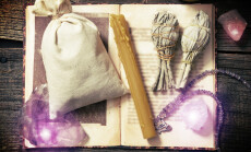 Natural,Gemstones,,White,Sage,,Candle,,Sack,On,A,Book,On