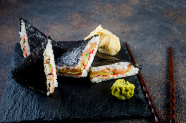 Tasty,Sushi,Sandwiches,With,Salmon,On,Black,Stone,Plate,With