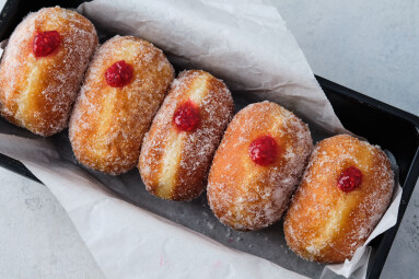 Traditional,German,Polish,Donut,With,Raspberry,Jam,Dusted,With,Sugar.